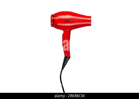 Professional red hair dryer. Isolated on white background. File contains clipping path Stock Photo