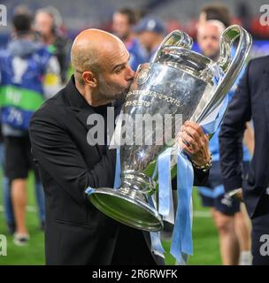 Istanbul, Turkey. 10th June, 2023. 10 Jun 2023 - Manchester City v Inter Milan - UEFA Champions League - Final - Ataturk Olympic Stadium.                                                                                           Pep Guardiola kisses the Champions League trophy.                   Picture Credit: Mark Pain / Alamy Live News Stock Photo