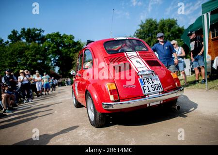 Bockhorn, Germany. 11th June, 2023. Participants start at the Bockhorn classic car market in an Abarth 595 for the Friesland Rally. Numerous owners of classic cars of all makes met at the weekend at the 40th Bockhorn classic car market. Around 120 vehicles started on Sunday morning for the Friesland Rally through the northwest. Credit: Hauke-Christian Dittrich/dpa/Alamy Live News Stock Photo