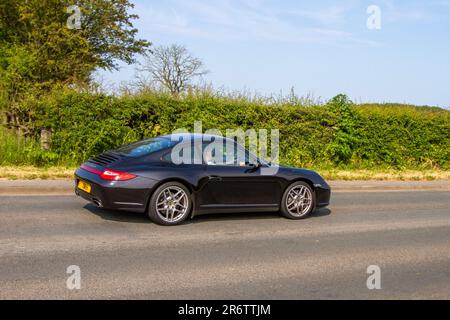 2009 Black Porsche 911 Carrera 4 PDK S-A, Coupe Petrol 3614 cc; Classic & Performance Motor Show at Hoghton Tower; Supercar Showtime June 2023 Stock Photo