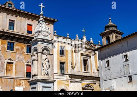 A 19 century stone monument by Ignazio Jacometti,known as the guglia or spire in Piazza di San Bartolomeo all'Isola,Tiber Island, Rome, Italy Stock Photo