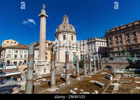 Trajan’s Forum with Santa Maria di Loreto, a 16th century church in the background ,viewed from Via dei Fori Imperiali,Rome,Italy Stock Photo