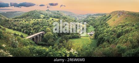 Panoramic landscape from Monsal Head looking down to the Monsal trail viaduct. Stock Photo