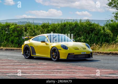 2021 Yellow Porsche 911, T 510 Start/Stop Yellow Car Coupe Petrol; at the Classic & Performance Motor Show at Hoghton Tower, UK Stock Photo