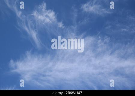 sun in the sky with clouds Stock Photo