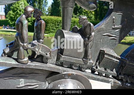 rotterdam, netherlands - 2023-05-31: detail of  g j de jongh(1845-1917)  monument (1928/1935) in the museum park - men busy with port construction wor Stock Photo