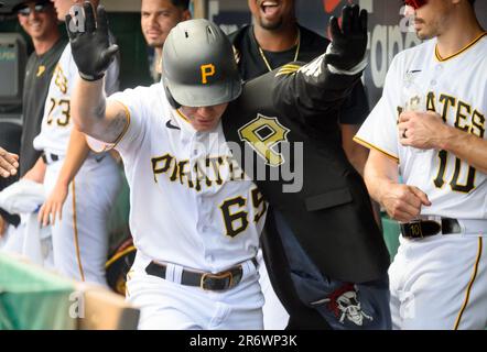 Pittsburgh Pirates center fielder Jack Suwinski looks out of the dugout  before the start of a baseball game against the Miami Marlins, Friday, June  23, 2023, in Miami. (AP Photo/Wilfredo Lee Stock