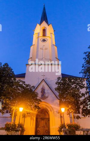 Evening view of Maria Himmelfahrt church in Garmisch-Partenkirchen, Bavaria state, Germany. Stock Photo