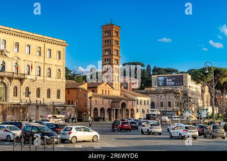 The Medieval façade of Santa Maria in Cosmedin, with the bell tower in Piazza della Bocca della Verità ,Rome,Italy Stock Photo