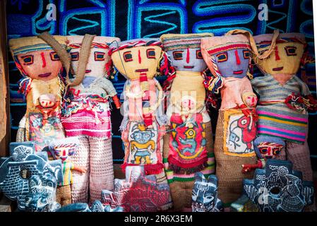 Ollantaytambo, Peru. Souvenir dolls, ancient village, entrance to Inca Ruins and Terraces, Sacred Valley. Stock Photo