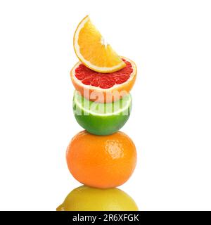 Stack of different fresh citrus fruits on white background Stock Photo