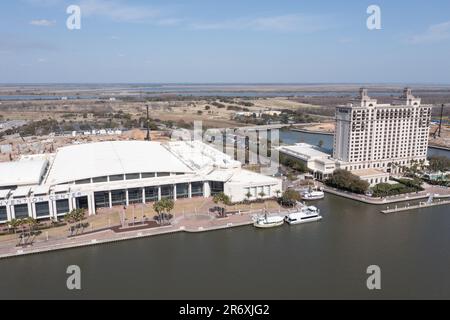 Savannah, Georgia - Feb 23, 2022: Aerial shot of the Savannah Convention Center and the Westin Hotel along the blue waters of the Savannah River. Stock Photo
