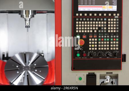 5 axis vertical CNC milling machine center. Selective focus. Stock Photo