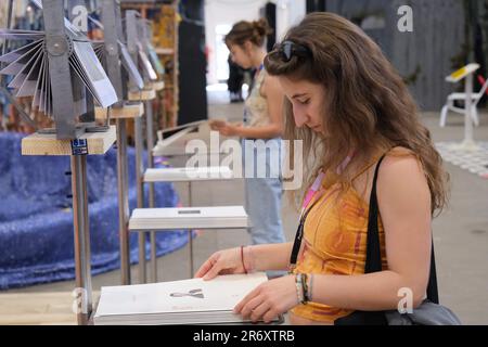 Prague, Czech Republic. 11th June, 2023. Visitors look at exhibits in the Chinese pavillion of the Prague Quadrennial of Performance Design and Space in Prague, Czech Republic, on June 11, 2023. This year's main exhibitions have some 100 installations created by teams representing 59 countries and regions, according to the organizers. The 2023 edition of the event runs from June 8-18. Credit: Deng Yaomin/Xinhua/Alamy Live News Stock Photo