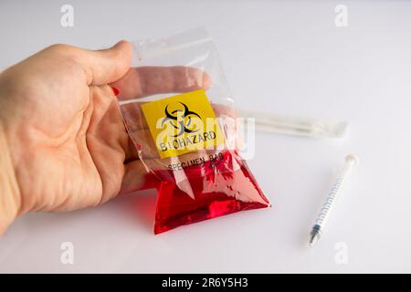 Biohazard specimen plastic bag on a white background Stock Photo