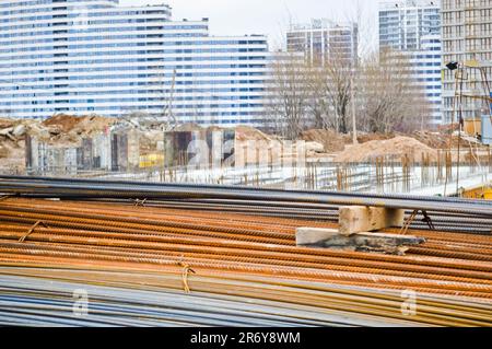 Iron metal rusty yellow bars of industrial building reinforcement from corrugated reinforcement for the construction of buildings made of reinforced c Stock Photo