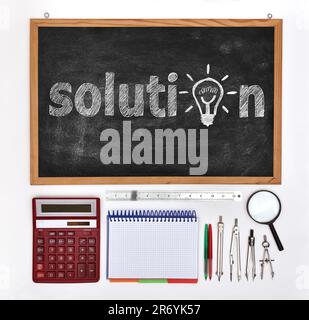 blackboard with drawing solution and business elements Stock Photo