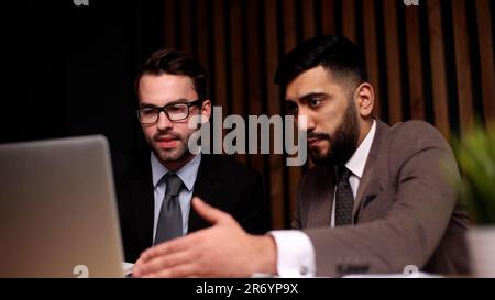 Interview with a happy, excited and confident human resources manager talking to a shortlist candidate for a job. Stock Photo