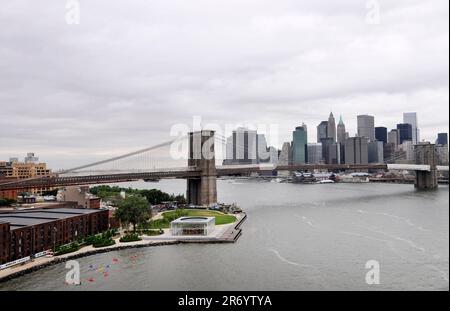 A view of the East River, The Brooklyn bridge and Manhattan seen from the Manhattan bridge in New York CIty, USA. Stock Photo