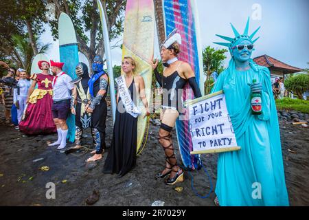 Surf in a carnival costumes, Bali, Indonesia. Stock Photo