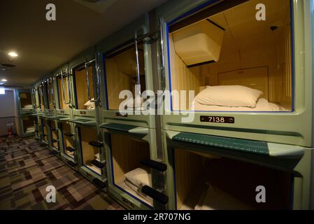 A Capsule hotel in Shinjuku, Tokyo, Japan. Stock Photo