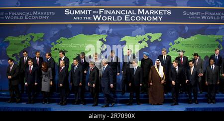 Washington, DC - November 15, 2008 -- World leaders walk off stage after a group photo at the start of the Summit on Financial Markets and the World Economy at the National Building Museum in Washington, DC, USA, 15 November 2008. The leaders of 20 countries are in attendance. Back row, from left to right: Mario Draghi, Chairman, Financial Security Forum; Ban Ki-Moon, Secretary-General of the United Nations; Silvio Berlusconi, President of Italy; Jose Manuel Barroso, President of the European Commission; Gordon Brown, Prime Minister of the United Kingdom; Angela Merkel, Chancellor of Germany Stock Photo
