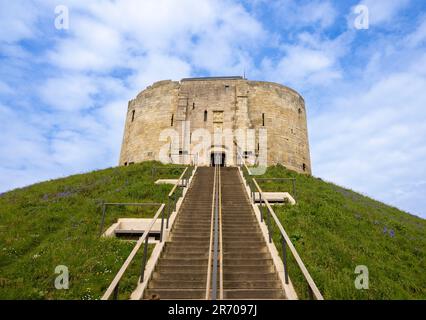 Clifford's Tower shot from ground level looking up the steep steps toward the top. Stock Photo