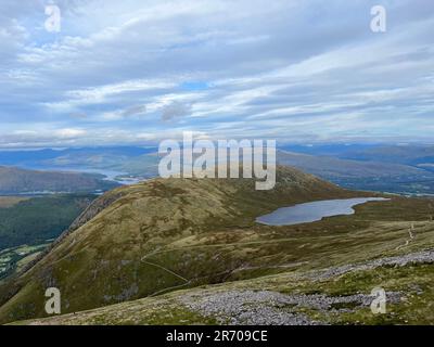 Aerial view of Ben Nevis, the highest mountain in the UK, showcasing its lush green vegetation Stock Photo