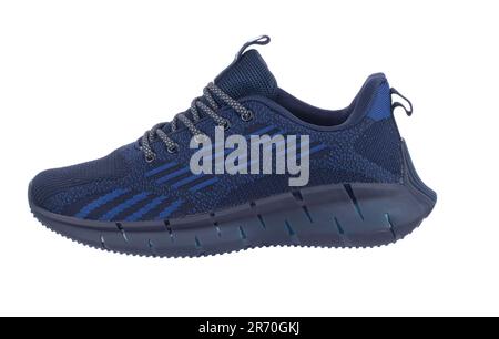Blue rag sneaker with gray stripes on a white background. Stock Photo