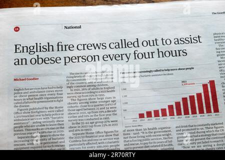 'English fire crews called out to assist an obese person every four hours' Guardian newspaper headline obesity article 3 June 2023 London England UK Stock Photo