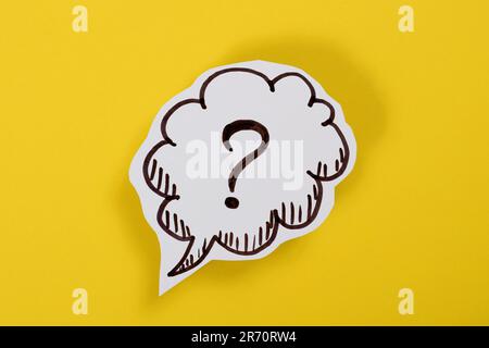 Paper speech bubble with question mark Stock Photo