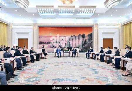 Beijing, China. 12th June, 2023. Li Shulei, a member of the Political Bureau of the Communist Party of China (CPC) Central Committee and head of the Publicity Department of the CPC Central Committee, meets with foreign representatives attending the China-Central Asia political parties dialogue, including Deputy Chairman of the Mazhilis of the Parliament of the Republic of Kazakhstan Rau Albert and Vice-Speaker of the Jogorku Kenesh of the Kyrgyz Republic Isaeva Dzhamilia, in Beijing, capital of China, June 12, 2023. Credit: Yue Yuewei/Xinhua/Alamy Live News Stock Photo