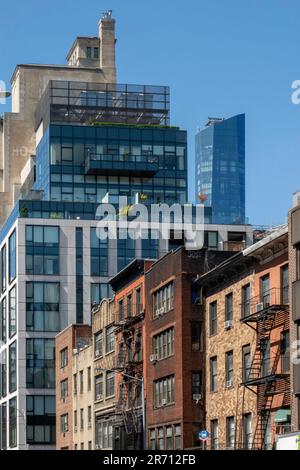 Contrasting architect of modern high-rises and brownstones in the nomad district of Manhattan, 2023, New York City, USA Stock Photo