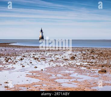 The rocky beach near Plover Scar Lighthouse on Cockerham Sands, near Lancaster Stock Photo