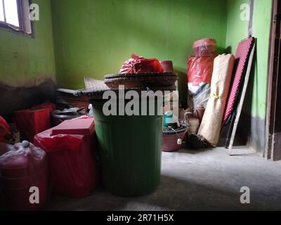 My grandma's house is being renovated so she is packing up her house furniture, like pots, buckets, pans etc Stock Photo