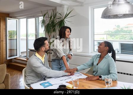 Start up business. Group of young architects at office. Architectural designers workers working at new project for client. Smart people projecting the Stock Photo