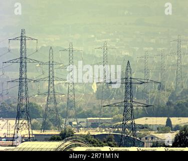 pylons near the modern Intu shopping centre on the banks of the clyde river near renfrew; Stock Photo