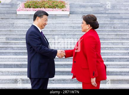 Beijing, China. 12th June, 2023. Chinese President Xi Jinping holds a welcoming ceremony for President of the Republic of Honduras Iris Xiomara Castro Sarmiento at the square outside the east entrance of the Great Hall of the People prior to their talks in Beijing, capital of China, June 12, 2023. Xi held talks with Castro, who is on a state visit to China, in Beijing on Monday. Credit: Huang Jingwen/Xinhua/Alamy Live News Stock Photo