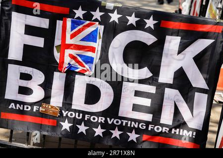 England, London, Westminster, Parliament Square, Protesters  banner against US president Joe Biden. Stock Photo