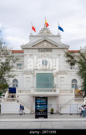 Santander, Spain - July 23 2022: View of main Facade of the Gran Casino Sardinero. Vertical photo. Spanish, Cantabria and European Union Flag. Stock Photo