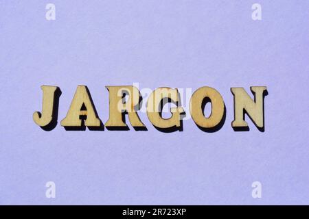 Jargon, word in wooden alphabet letters isolated on purple background Stock Photo