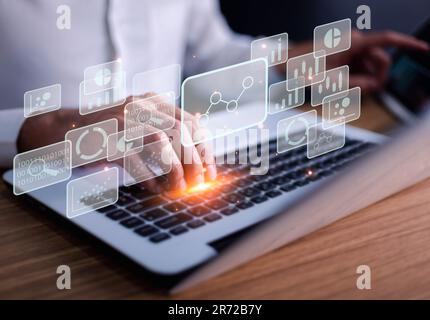 Big data analytics and business intelligence concept with chart and graph icons on a digital screen interface and a businessman use tablet in backgrou Stock Photo