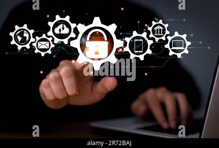 Cyber security, internet network. Businessman using laptop and digital tablet with digital padlock, personal data protection on internet technology ne Stock Photo