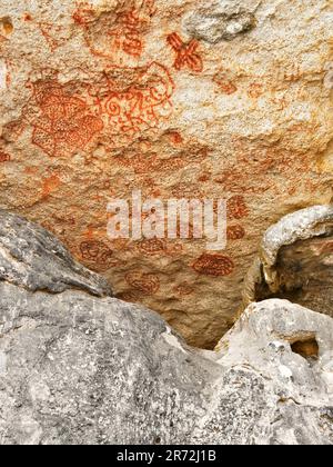 Arawak ancient human cave paintings in the Caribbean Stock Photo