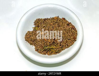 Edible maggots larvae pile of the red weevil tree in a plate Stock Photo