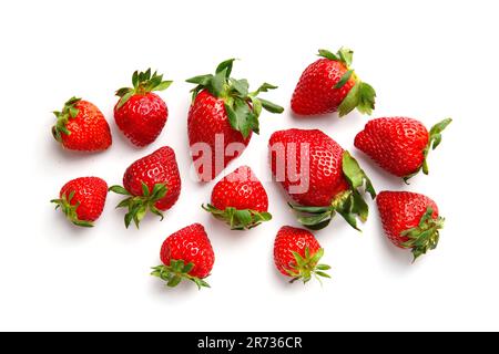 Fresh ripe organic strawberries on a white background, top view. Large berries of strawberries on white isolated. Stock Photo