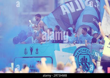 Manchester, UK. 12th June, 2023. Manchester City players during the Manchester City's victory parade for European Cup, the FA Cup and the Premier League, in the streets of Manchester, northern England on June 12, 2023  (Photo by Phil Bryan/Alamy Live News) Credit: Philip Bryan/Alamy Live News Stock Photo