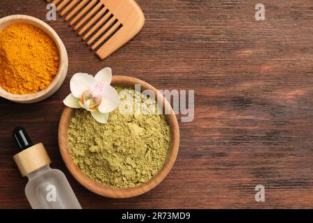 Flat lay composition with henna and turmeric powder on light grey table ...
