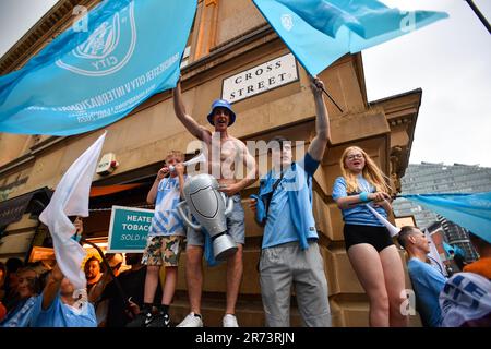 Manchester, UK. 12th June, 2023. Manchester City fans during their Treble winning Victory Parade ending at the Town Hall, Manchester. Picture date: 12th June 2023. Picture credit should read: Gary Oakley/Sportimage Credit: Sportimage Ltd/Alamy Live News Stock Photo