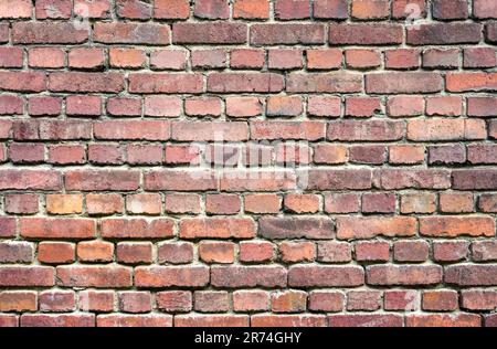 Old red brick wall. Background. Stone wall. Stock Photo